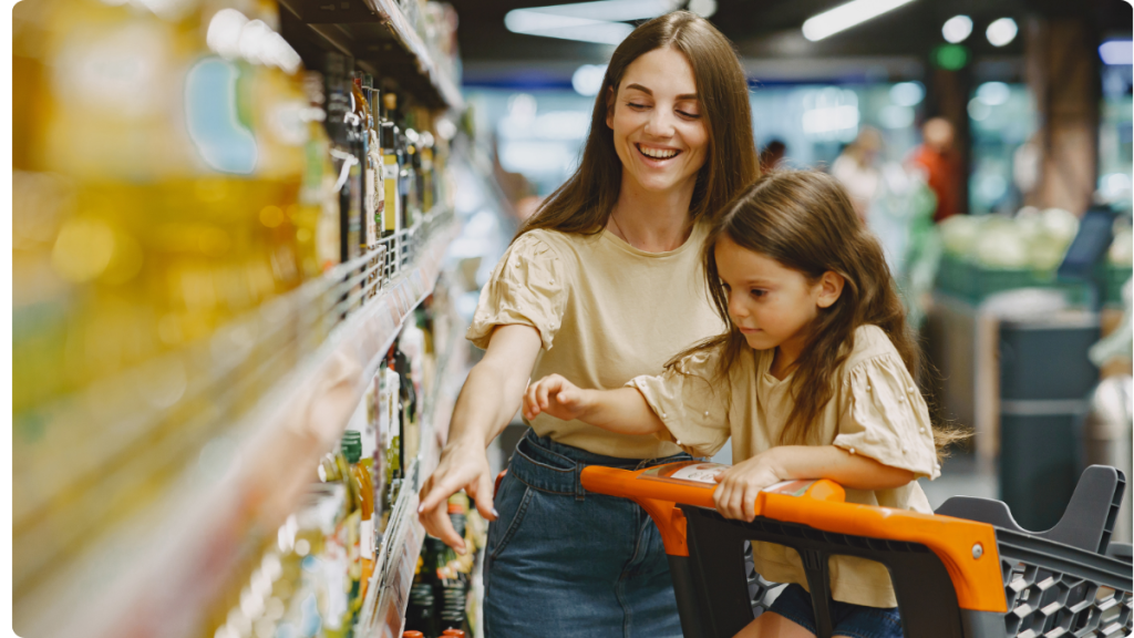 Mom and child grocery shopping