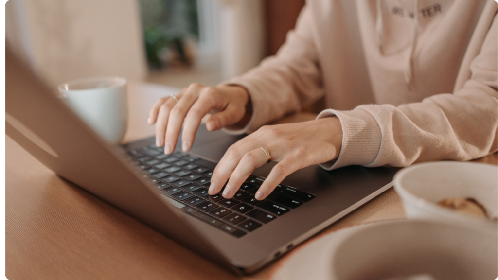 Woman typing on computer